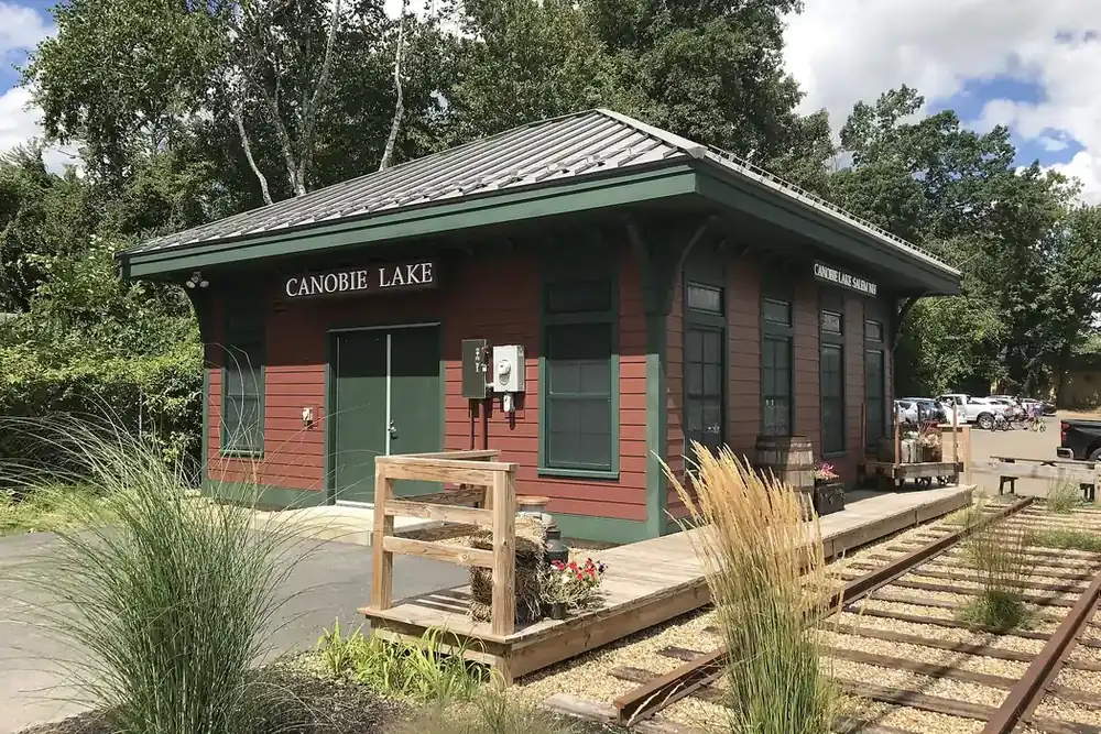 Restored Canobie Lake railroad station beside old tracks in Salem, New Hampshire